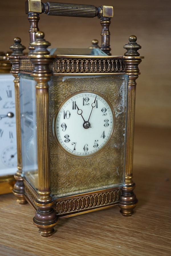 A French brass repeating carriage clock, together with another enamelled dial carriage clock, both with keys, tallest 15cm. Condition - not tested